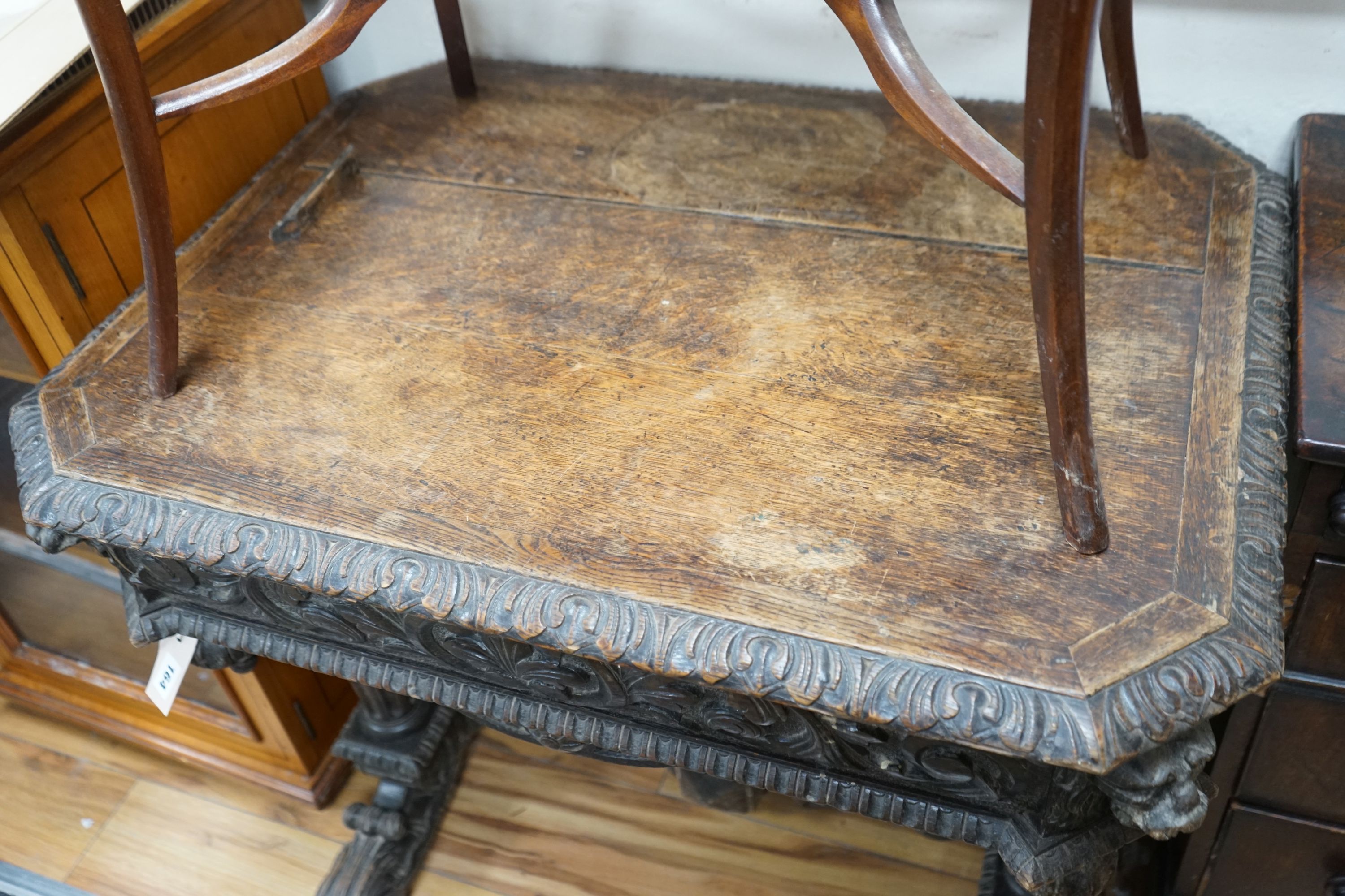 A late 19th century Flemish octagonal carved oak centre table, width 80cm, depth 60cm, height 72cm